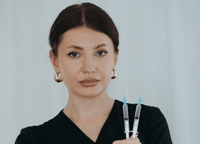 Esthetician working with a client